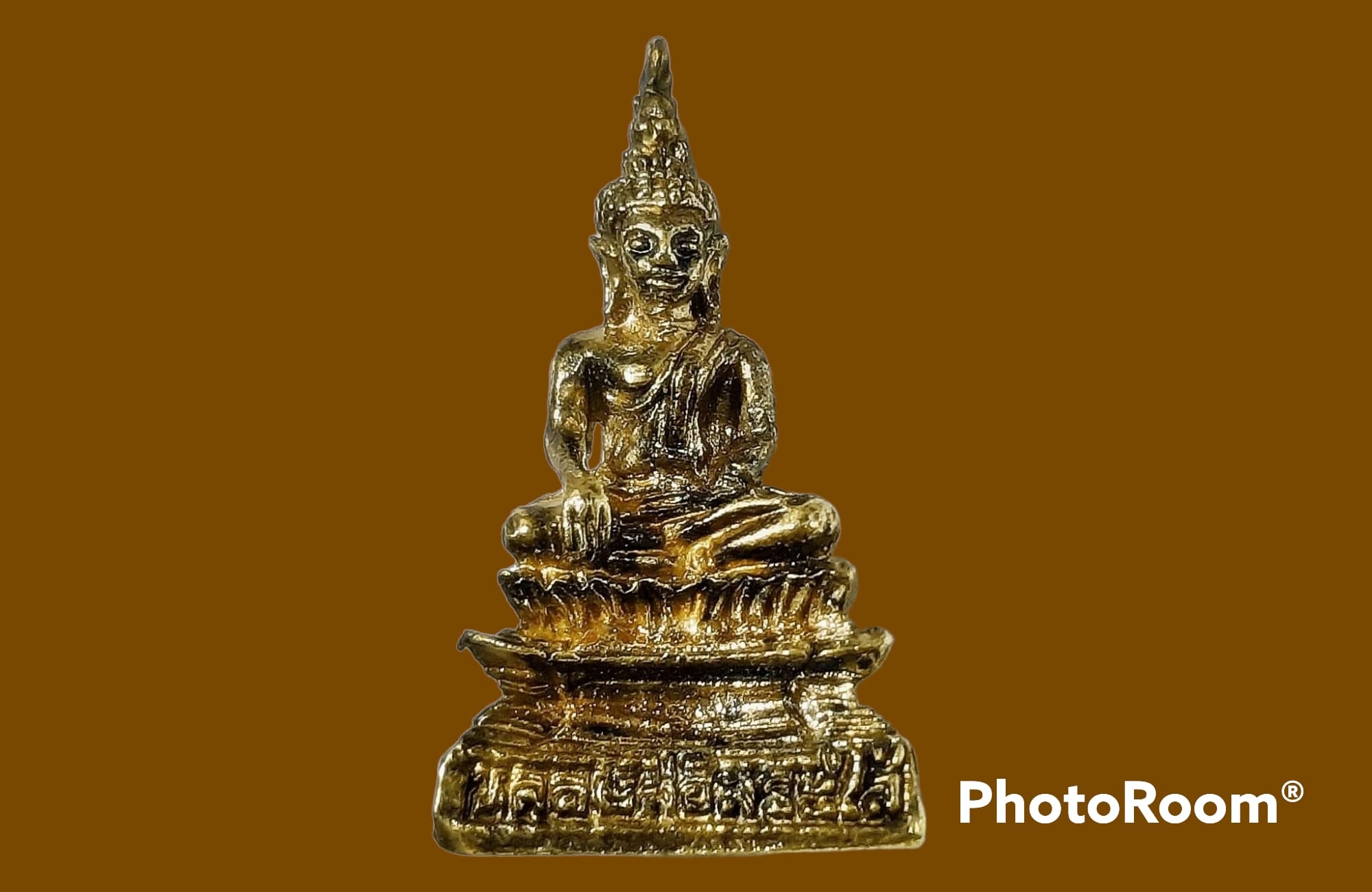 รูปเหมือนหล่อ หลวงพ่อพระใส วัดโพธิ์ชัย จ.หนองคาย ปี 2539 เนื้อกะหลั่ยทอง ขนาด 1.4 x 2.5 cm.