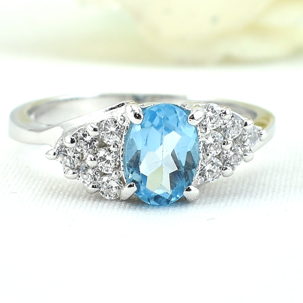 แหวนเงินแท้ราคาถูกชุบทองคำขาว สวิสบลูโทปาซแท้ 1.05 กะรัต เพชรCZ 0.36 กะรัต งานประณีตสวยงาม สั่งผลิตค่ะ