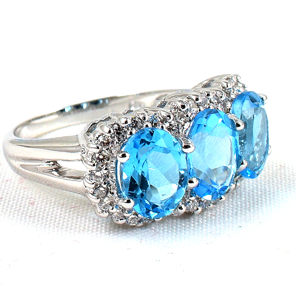 แหวนเงินแท้ราคาถูกชุบทองคำขาว สวิสบลูโทปาซแท้ 5.55 กะรัต เพชรCZ 0.36 กะรัต งานประณีตสวยงาม สั่งผลิตค่ะ