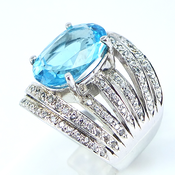 แหวนเงินแท้ราคาถูกชุบทองคำขาว สวิสบลูโทปาซแท้ 8.80 กะรัต เพชรCZ 1.10 กะรัต งานประณีตสวยงาม สั่งผลิตค่ะ