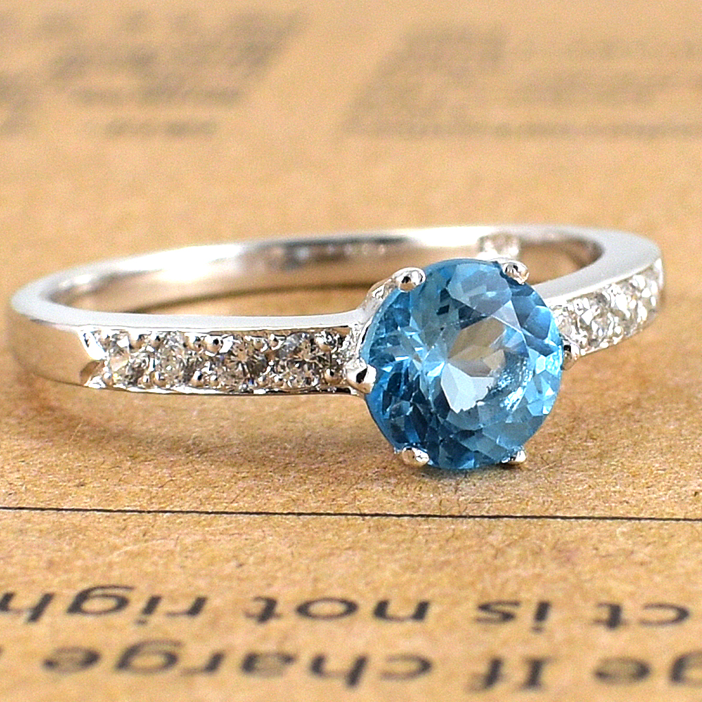 แหวนเงินแท้ราคาถูกชุบทองคำขาว สวิสบลูโทปาซแท้ 0.92 กะรัต เพชรCZ 0.20 กะรัต งานประณีตสวยงาม สั่งผลิตค่ะ