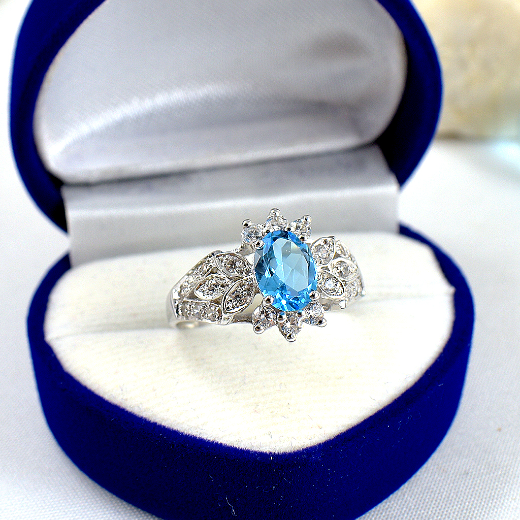 แหวนเงินแท้ราคาถูกชุบทองคำขาว สวิสบลูโทปาซแท้ 1.85 กะรัต เพชรCZ 0.27 กะรัต งานประณีตสวยงาม สั่งผลิตค่ะ