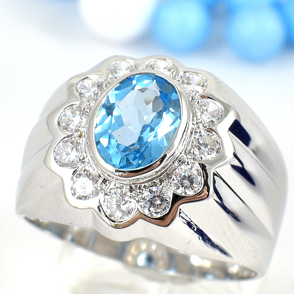 แหวนเงินแท้ราคาถูกชุบทองคำขาว สวิสบลูโทปาซแท้ 2.35 กะรัต เพชรCZ 0.36 กะรัต งานประณีตสวยงาม สั่งผลิตค่ะ