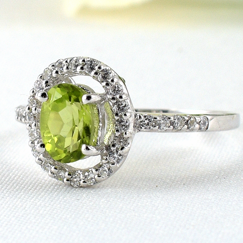 แหวนเงินแท้ราคาถูกชุบทองคำขาว เพอริดอทแท้ 0.98 กะรัต เพชรCZ 0.30 กะรัต งานประณีตสวยงาม สั่งผลิตค่ะ