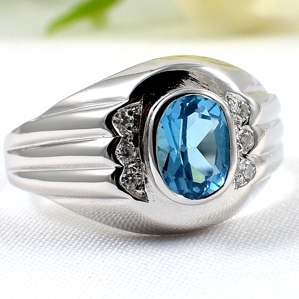 แหวนเงินแท้ราคาถูกชุบทองคำขาว สวิสบลูโทปาซแท้ 0.95 กะรัต เพชรCZ 0.06 กะรัต งานประณีตสวยงาม สั่งผลิตค่ะ