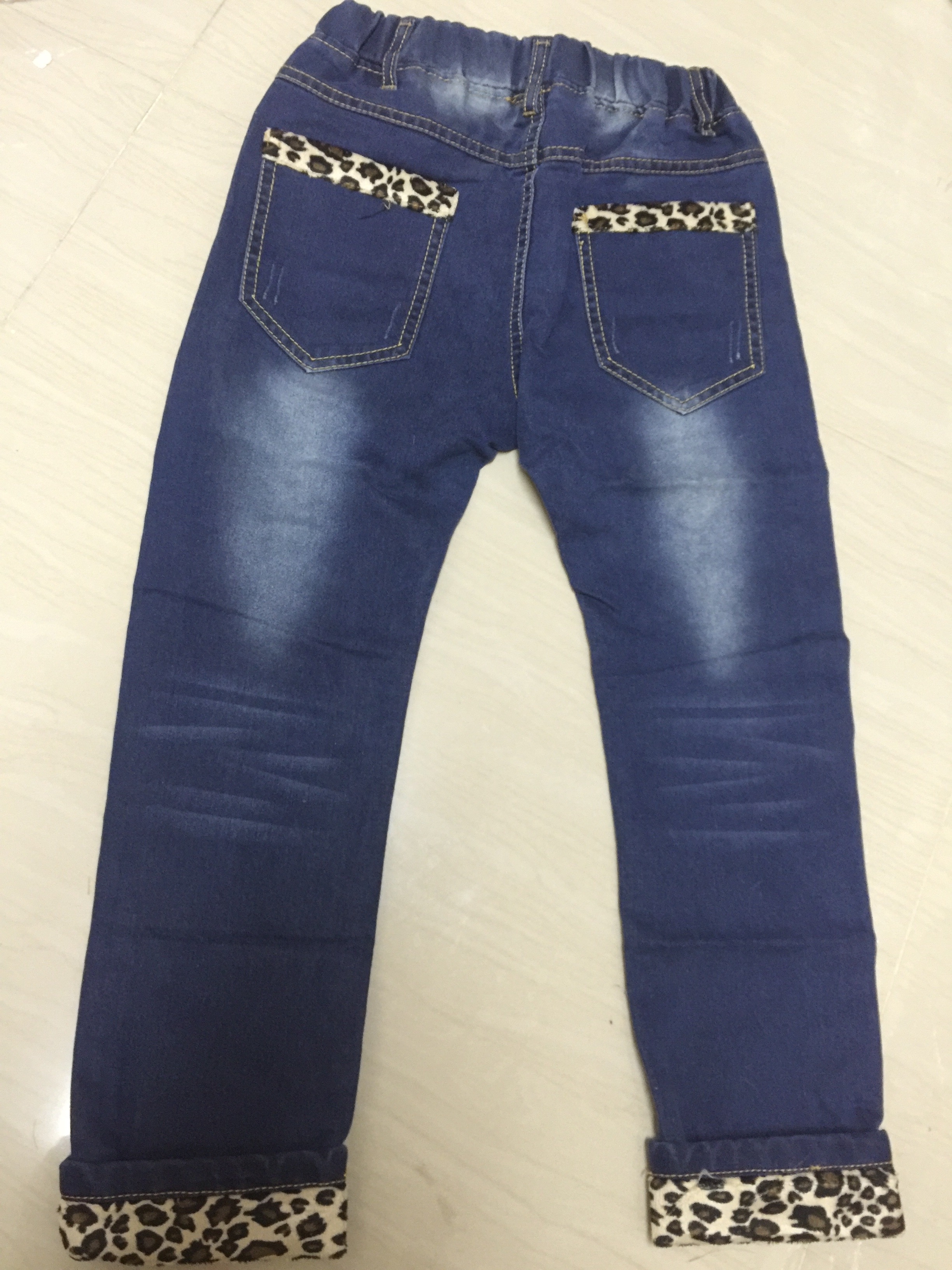 กางเกงยีนส์ แต่งลายเสือ