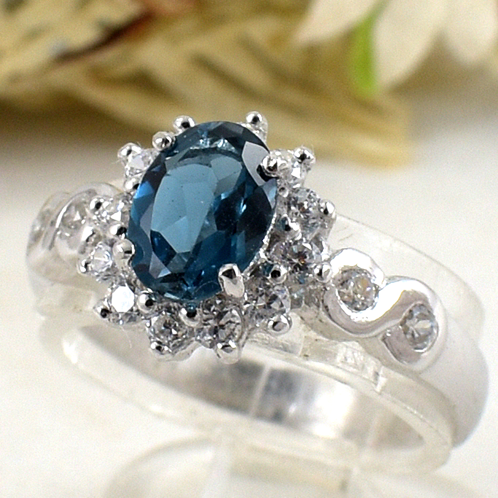 แหวนเงินแท้ราคาถูกชุบทองคำขาว ลอนดอนบลูโทปาซแท้ 0.95 กะรัต เพชรCZ 0.40 กะรัต งานประณีตสวยงาม สั่งผลิตค่ะ