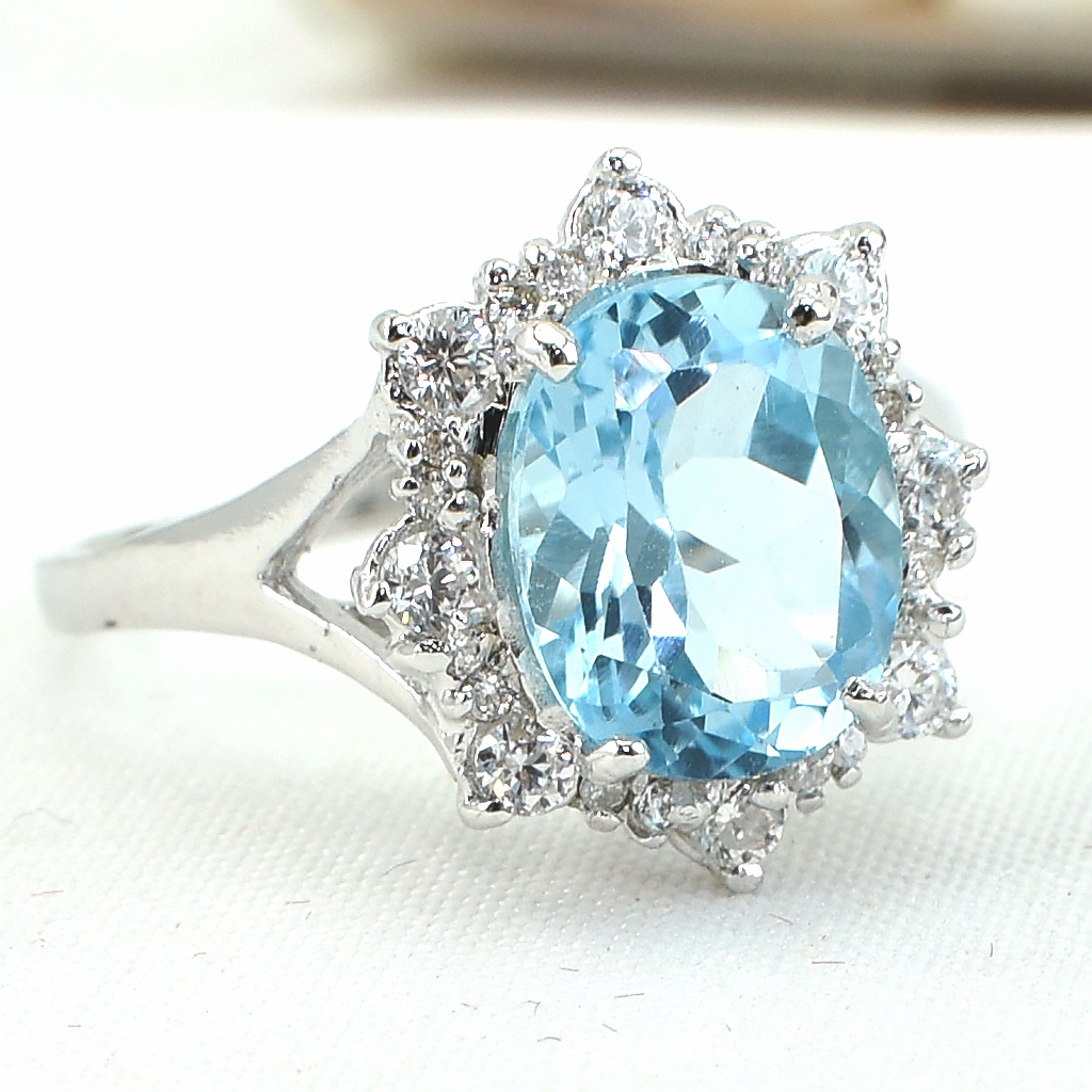 แหวนเงินแท้ราคาถูกชุบทองคำขาว สกายบลูโทปาซแท้ 3.35 กะรัต เพชรCZ 0.352 กะรัต งานประณีตสวยงาม สั่งผลิตค่ะ