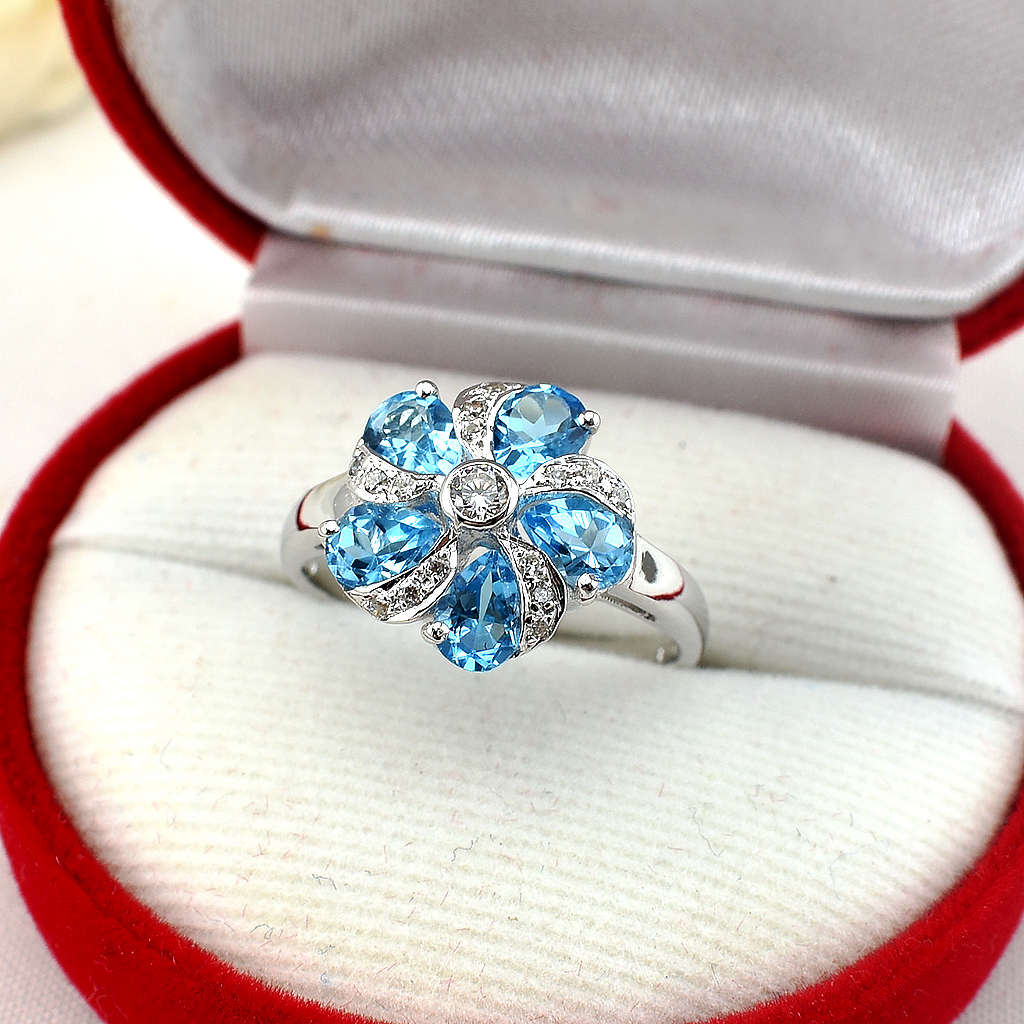 แหวนเงินแท้ราคาถูกชุบทองคำขาว สวิสบลูโทปาซแท้ 1.95 กะรัต เพชรCZ 0.165 กะรัต งานประณีตสวยงาม สั่งผลิตค่ะ