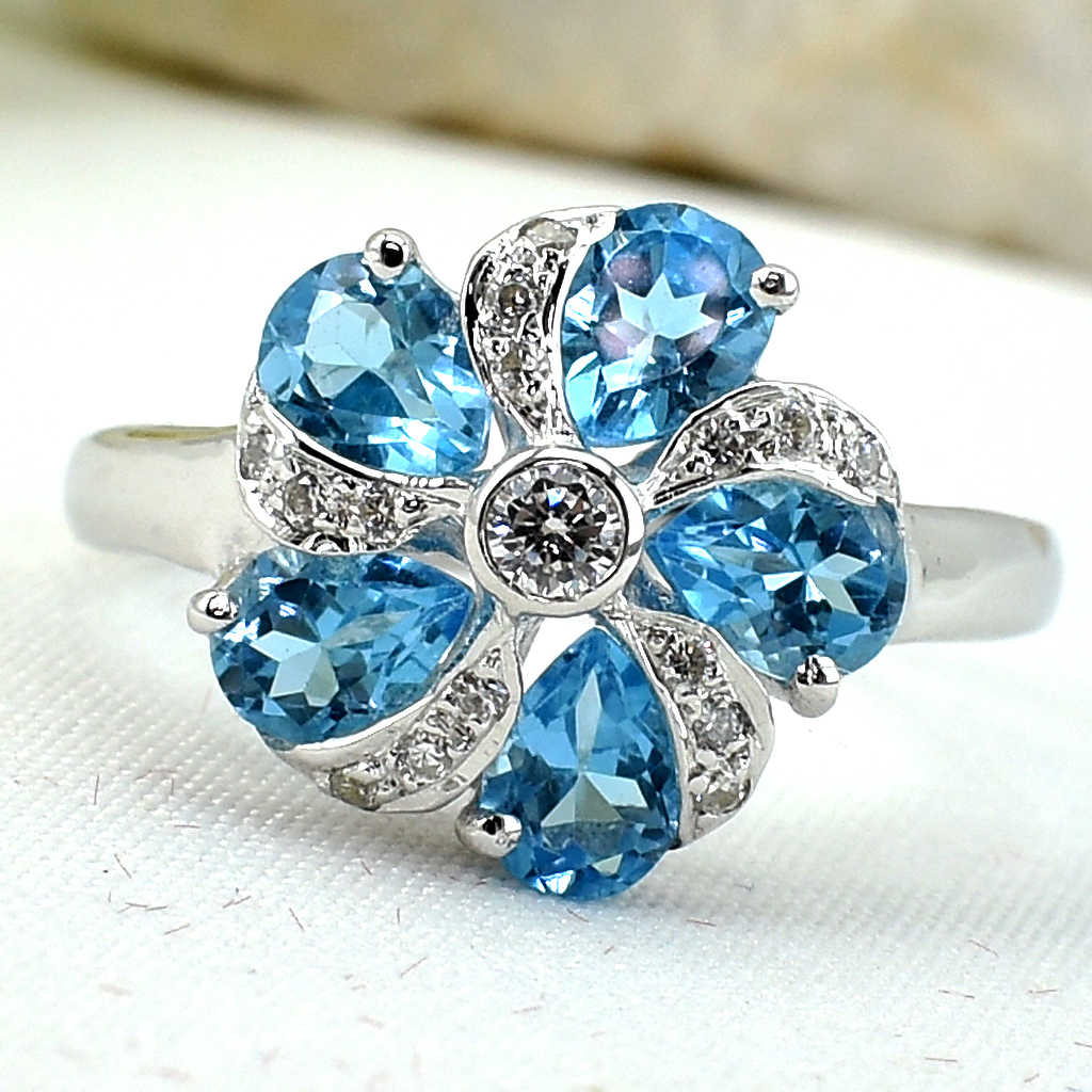 แหวนเงินแท้ราคาถูกชุบทองคำขาว สวิสบลูโทปาซแท้ 1.95 กะรัต เพชรCZ 0.165 กะรัต งานประณีตสวยงาม สั่งผลิตค่ะ