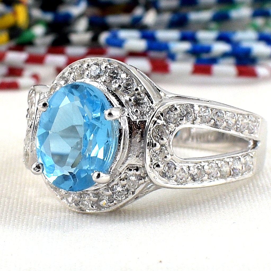 แหวนเงินแท้ราคาถูกชุบทองคำขาว สวิสบลูโทปาซแท้ 2.25 กะรัต เพชรCZ 0.69 กะรัต งานประณีตสวยงาม สั่งผลิตค่ะ