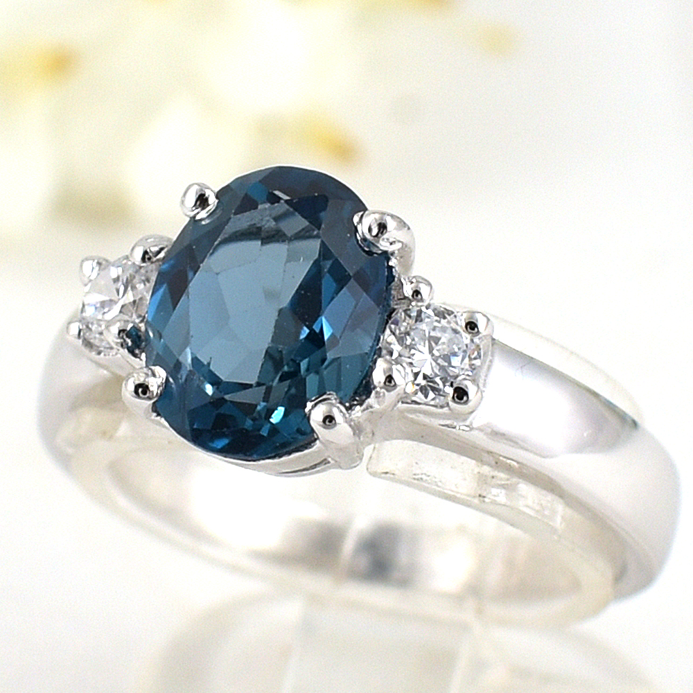 แหวนเงินแท้ราคาถูกชุบทองคำขาว ลอนดอนบลูโทปาซแท้ 2.35 กะรัต เพชรCZ 0.20 กะรัต งานประณีตสวยงาม สั่งผลิตค่ะ