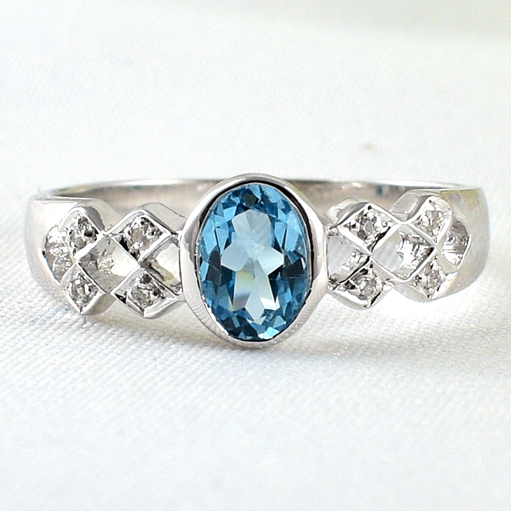 แหวนเงินแท้ราคาถูกชุบทองคำขาว สวิสบลูโทปาซแท้ 0.65 กะรัต เพชรCZ 0.056 กะรัต งานประณีตสวยงาม สั่งผลิตค่ะ