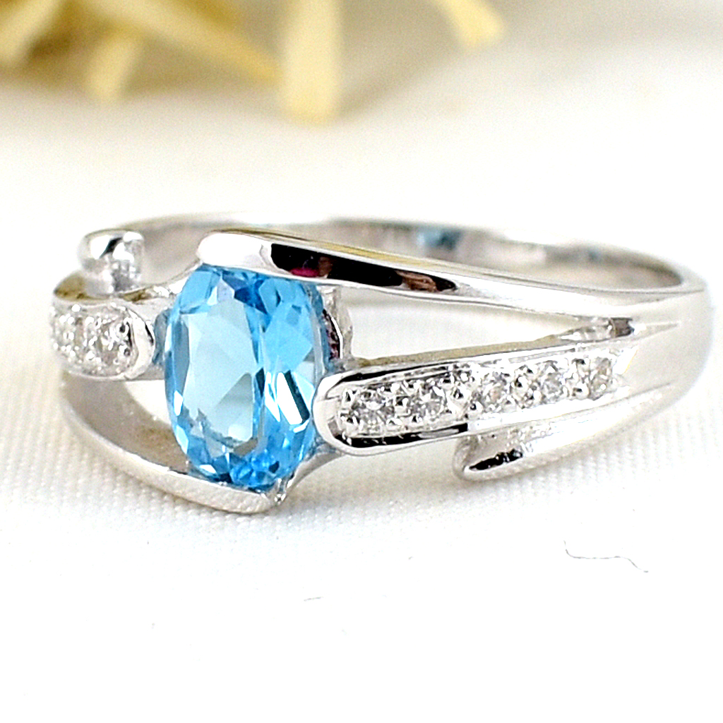 แหวนเงินแท้ราคาถูกชุบทองคำขาว สวิสบลูโทปาซแท้ 0.95 กะรัต เพชรCZ 0.13 กะรัต งานประณีตสวยงาม สั่งผลิตค่ะ