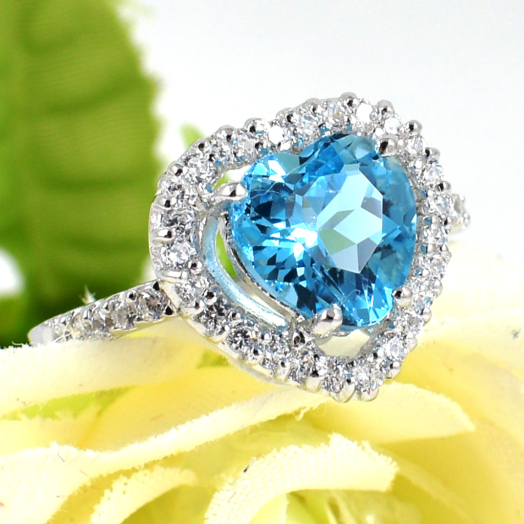 แหวนเงินแท้ราคาถูกชุบทองคำขาว สวิสบลูโทปาซแท้ 2.45 กะรัต เพชรCZ 0.252 กะรัต งานประณีตสวยงาม สั่งผลิตค่ะ