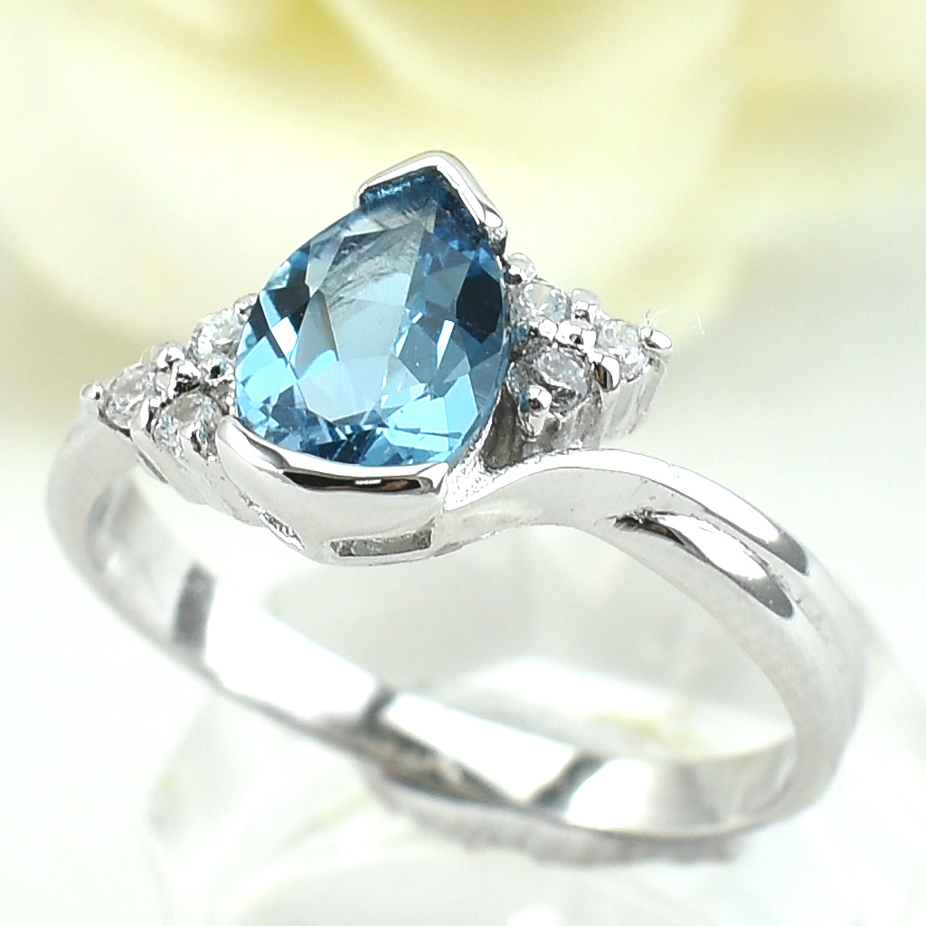 แหวนเงินแท้ราคาถูกชุบทองคำขาว สวิสบลูโทปาซแท้ 1.35 กะรัต เพชรCZ 0.06 กะรัต งานประณีตสวยงาม สั่งผลิตค่ะ