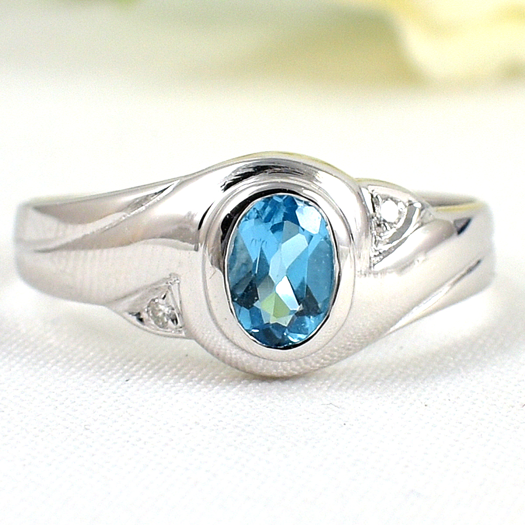 แหวนเงินแท้ราคาถูกชุบทองคำขาว สวิสบลูโทปาซแท้ 0.65 กะรัต เพชรCZ 0.014 กะรัต งานประณีตสวยงาม สั่งผลิตค่ะ