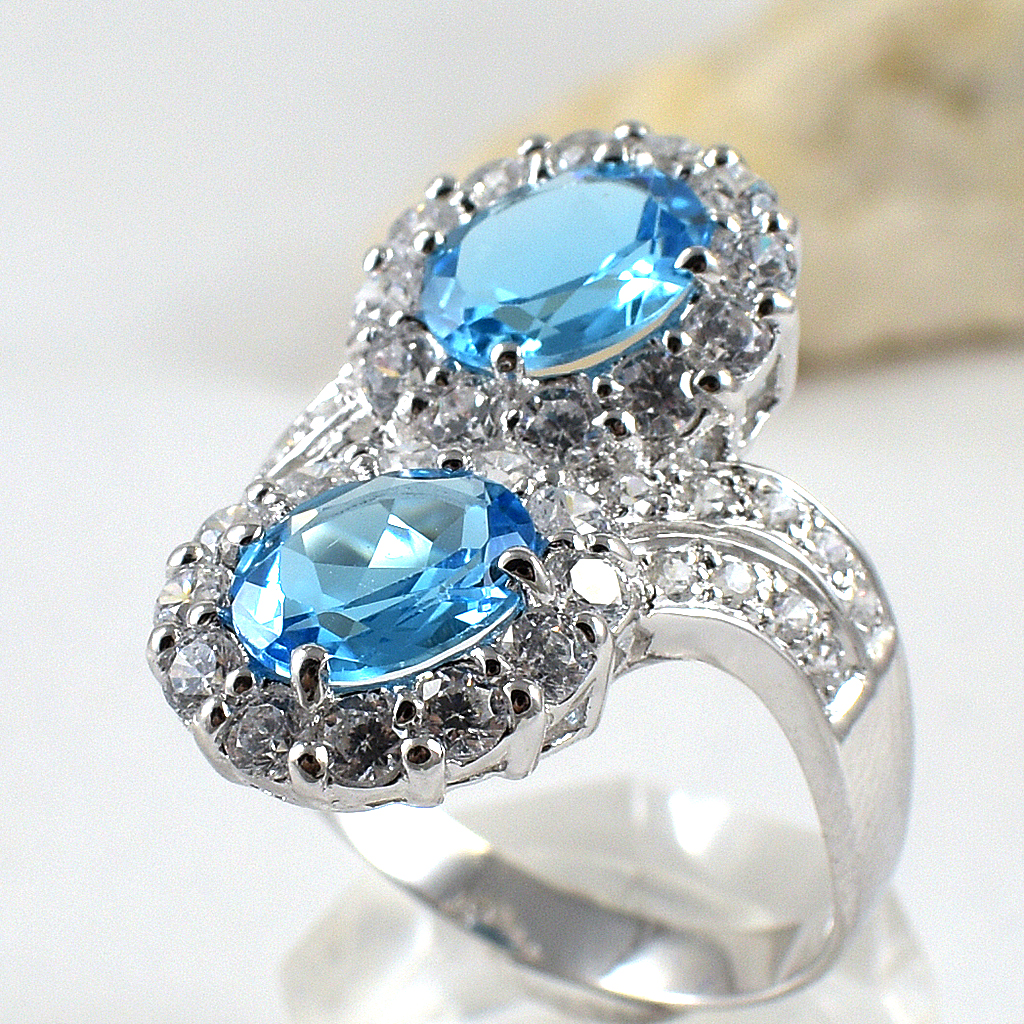 แหวนเงินแท้ราคาถูกชุบทองคำขาว สวิสบลูโทปาซแท้ 3.70 กะรัต เพชรCZ 1.23 กะรัต งานประณีตสวยงาม สั่งผลิตค่ะ