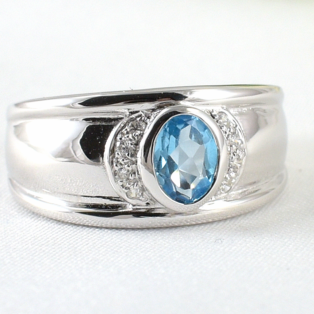 แหวนเงินแท้ราคาถูกชุบทองคำขาว สวิสบลูโทปาซแท้ 0.95 กะรัต เพชรCZ 0.08 กะรัต งานประณีตสวยงาม สั่งผลิตค่ะ