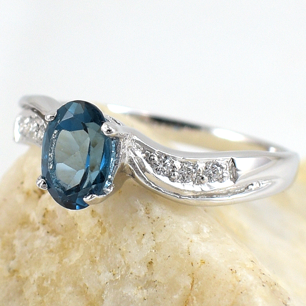 แหวนเงินแท้ราคาถูกชุบทองคำขาว ลอนดอนบลูโทปาซแท้ 0.95 กะรัต เพชรCZ 0.06 กะรัต งานประณีตสวยงาม สั่งผลิตค่ะ