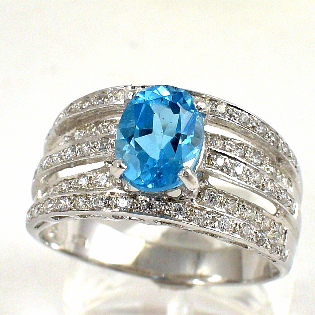 แหวนเงินแท้ราคาถูกชุบทองคำขาว สวิสบลูโทปาซแท้ 1.85 กะรัต เพชรCZ 0.62 กะรัต งานประณีตสวยงาม สั่งผลิตค่ะ