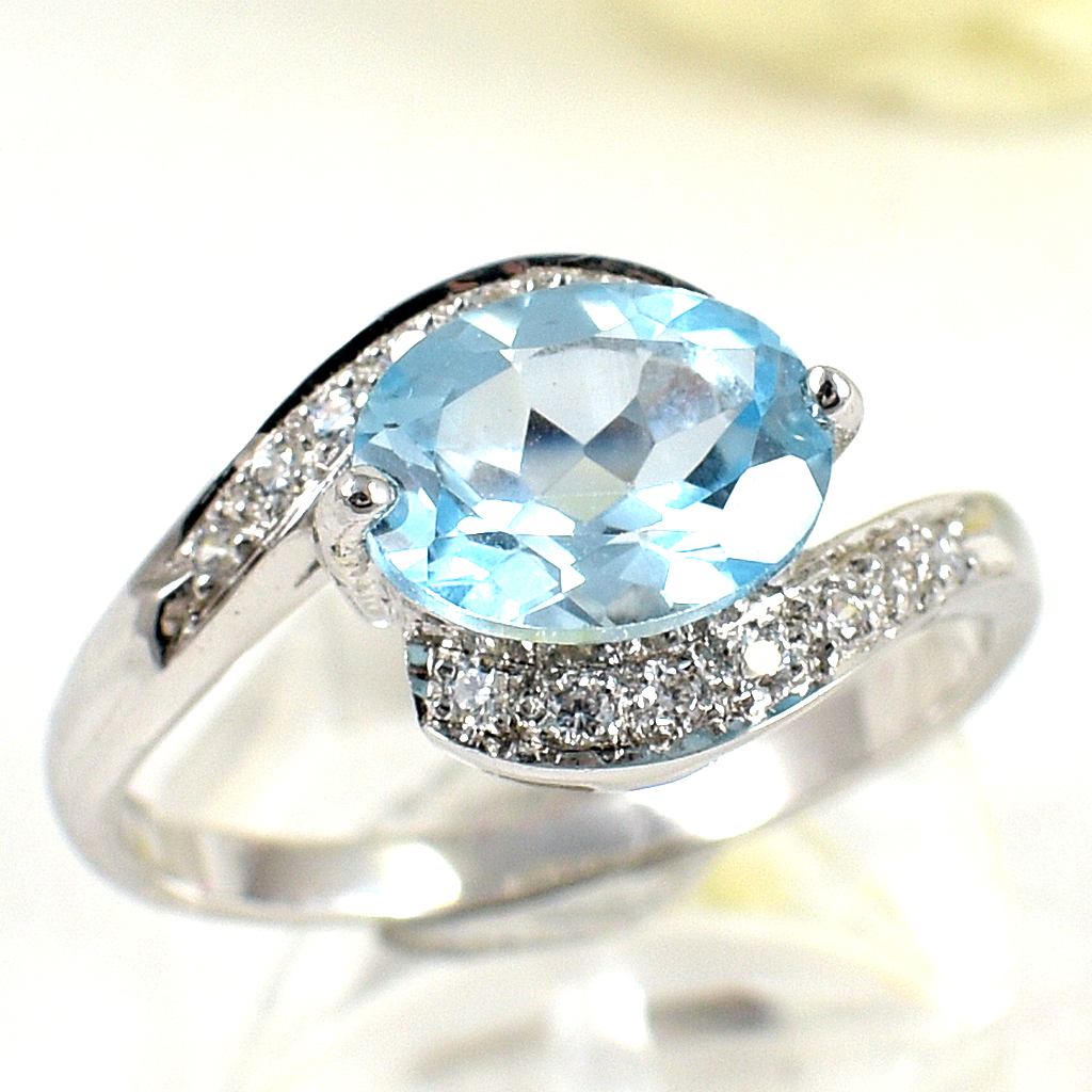 แหวนเงินแท้ราคาถูกชุบทองคำขาว สกายบลูโทปาซแท้ 2.29 กะรัต เพชรCZ 0.14 กะรัต งานประณีตสวยงาม สั่งผลิตค่ะ