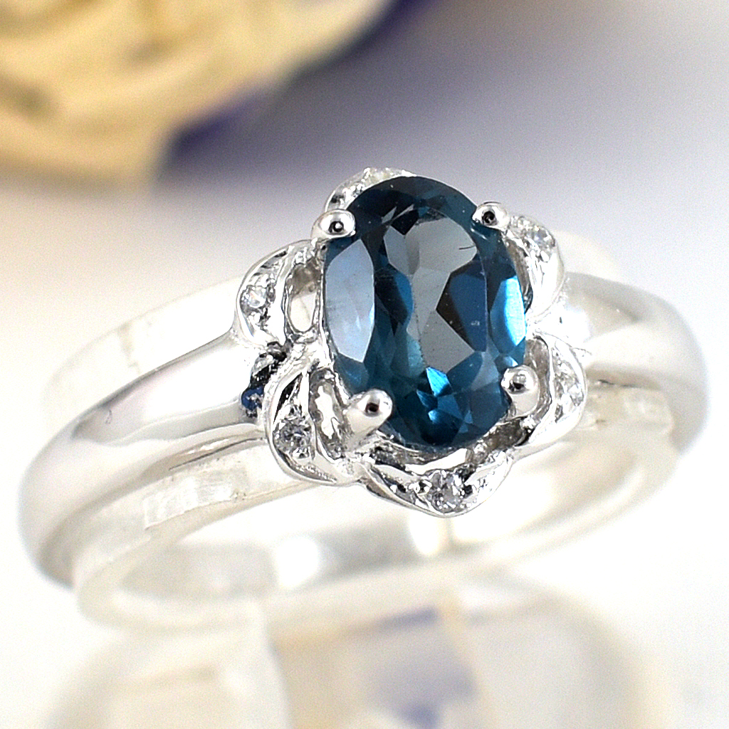 แหวนเงินแท้ราคาถูกชุบทองคำขาว ลอนดอนบลูโทปาซแท้ 0.95 กะรัต เพชรCZ 0.06 กะรัต งานประณีตสวยงาม สั่งผลิตค่ะ