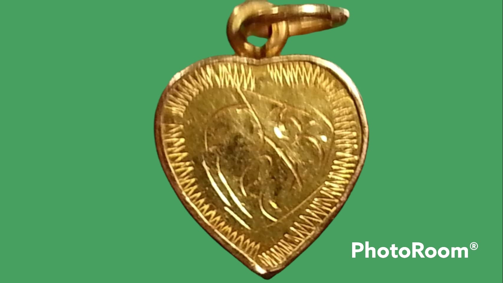 เหรียญหัวใจ หลวงปู่แหวน วัดดอยแม่ปั๋ง จ.เชียงใหม่ เลี่ยมทอง