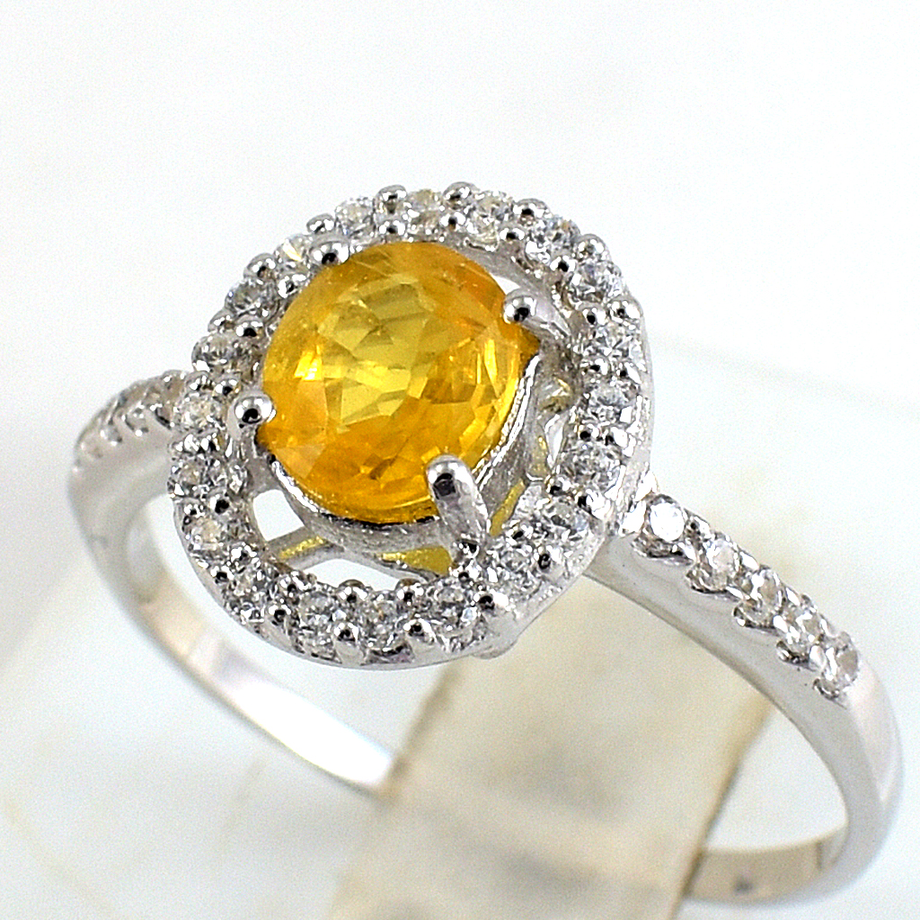 แหวนเงินแท้ราคาถูกชุบทองคำขาว บุษราคัมแท้ 0.95 กะรัต เพชรCZ 0.30 กะรัต งานประณีตสวยงาม สั่งผลิตค่ะ