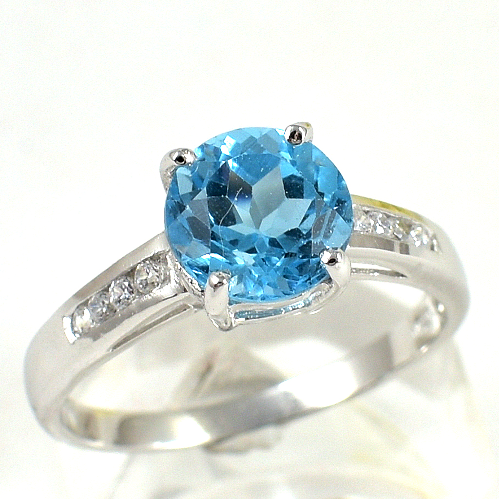 แหวนเงินแท้ราคาถูกชุบทองคำขาว สวิสบลูโทปาซแท้ 1.95 กะรัต เพชรCZ 0.06 กะรัต งานประณีตสวยงาม สั่งผลิตค่ะ