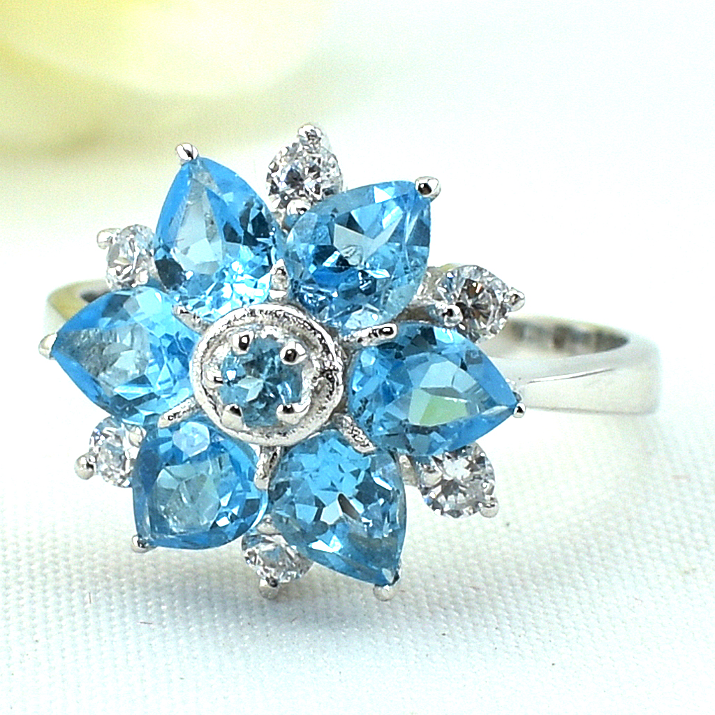 แหวนเงินแท้ราคาถูกชุบทองคำขาว สวิสบลูโทปาซแท้ 2.49 กะรัต เพชรCZ 0.30 กะรัต งานประณีตสวยงาม สั่งผลิตค่ะ