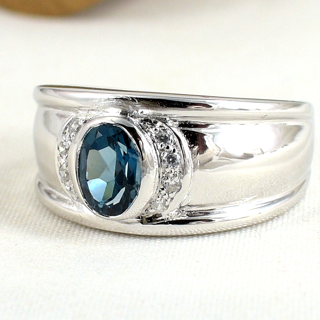 แหวนเงินแท้ราคาถูกชุบทองคำขาว ลอนดอนบลูโทปาซแท้ 0.95 กะรัต เพชรCZ 0.08 กะรัต งานประณีตสวยงาม สั่งผลิตค่ะ