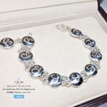 สร้อยข้อมือเงินแท้ 92.5% ข้อมือหัวนะโม ตะขอเกี่ยว S - ด้านหลังพระธาตุนคร (เรือนเงินแท้) หน้ากว้าง 11 มิล