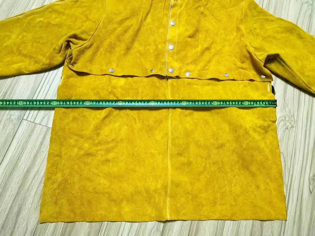 เสื้อแจ็คเก็ตหนังครึ่งตัวติดกระดุมแป๊กถอดได้ด้านหลังเป็นยางยืด กันความร้อนประกายไฟสะเก็ดไฟงานเชื่อม Half Jacket Cowhide Bib Snap fastener Back is elastic Fire-Resistant Welding Protection