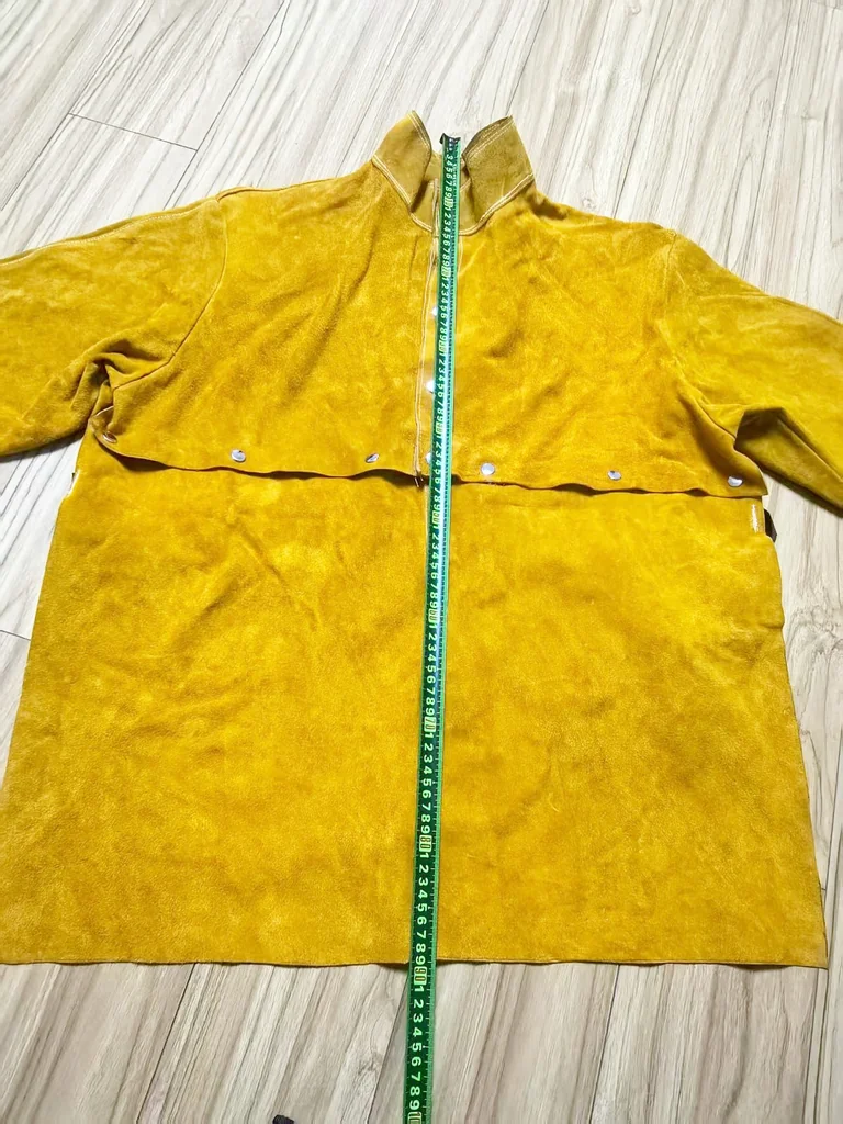 เสื้อแจ็คเก็ตหนังครึ่งตัวติดกระดุมแป๊กถอดได้ด้านหลังเป็นยางยืด กันความร้อนประกายไฟสะเก็ดไฟงานเชื่อม Half Jacket Cowhide Bib Snap fastener Back is elastic Fire-Resistant Welding Protection